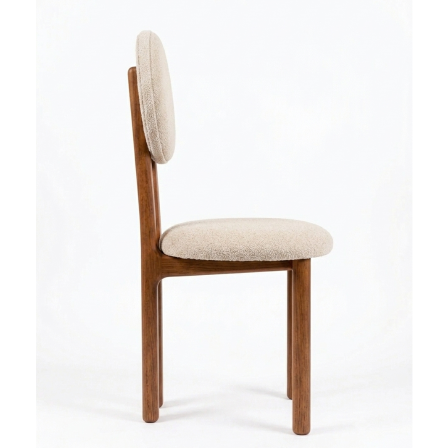 A modern dining chair with a warm brown wooden frame and light beige textured boucle upholstery on the seat and oval backrest, shown against a plain white studio background.